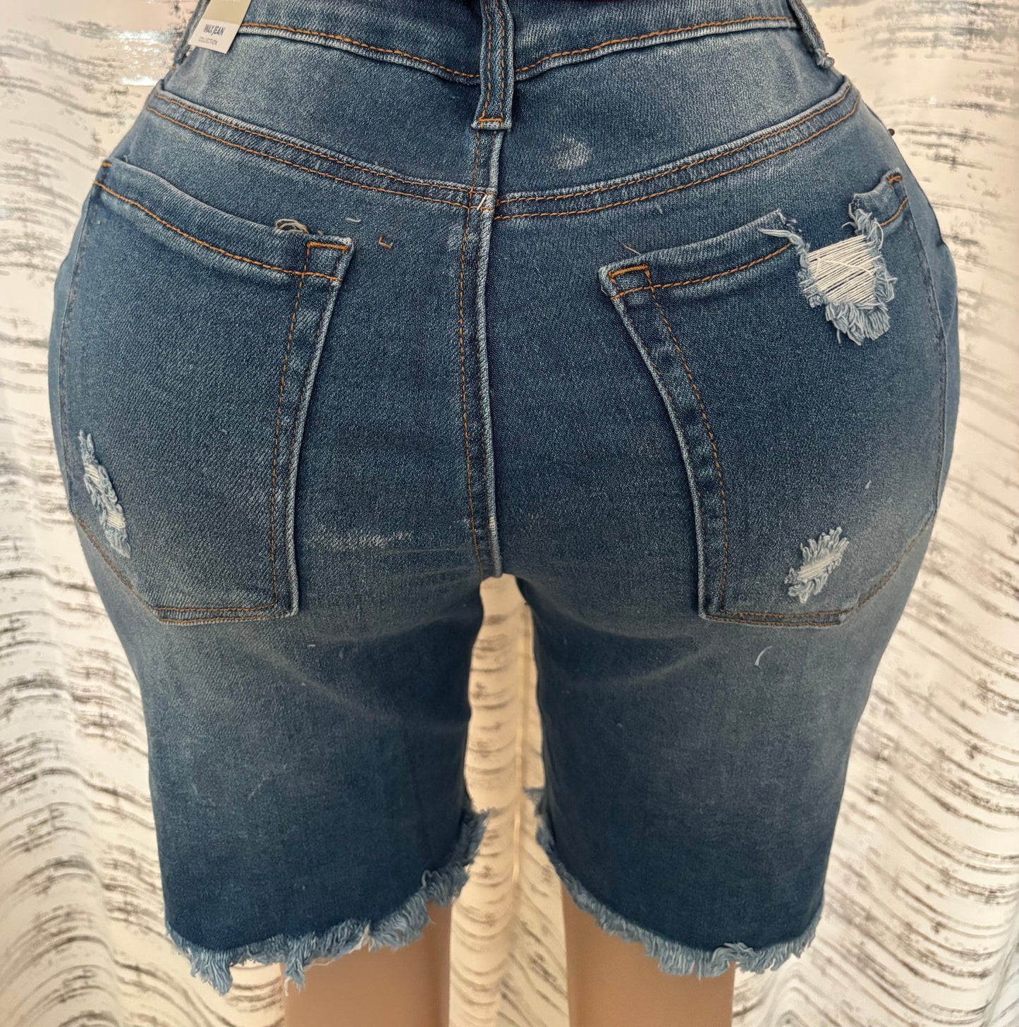 HIGH RISE DISTRESSED BIKER SHORT JEAN