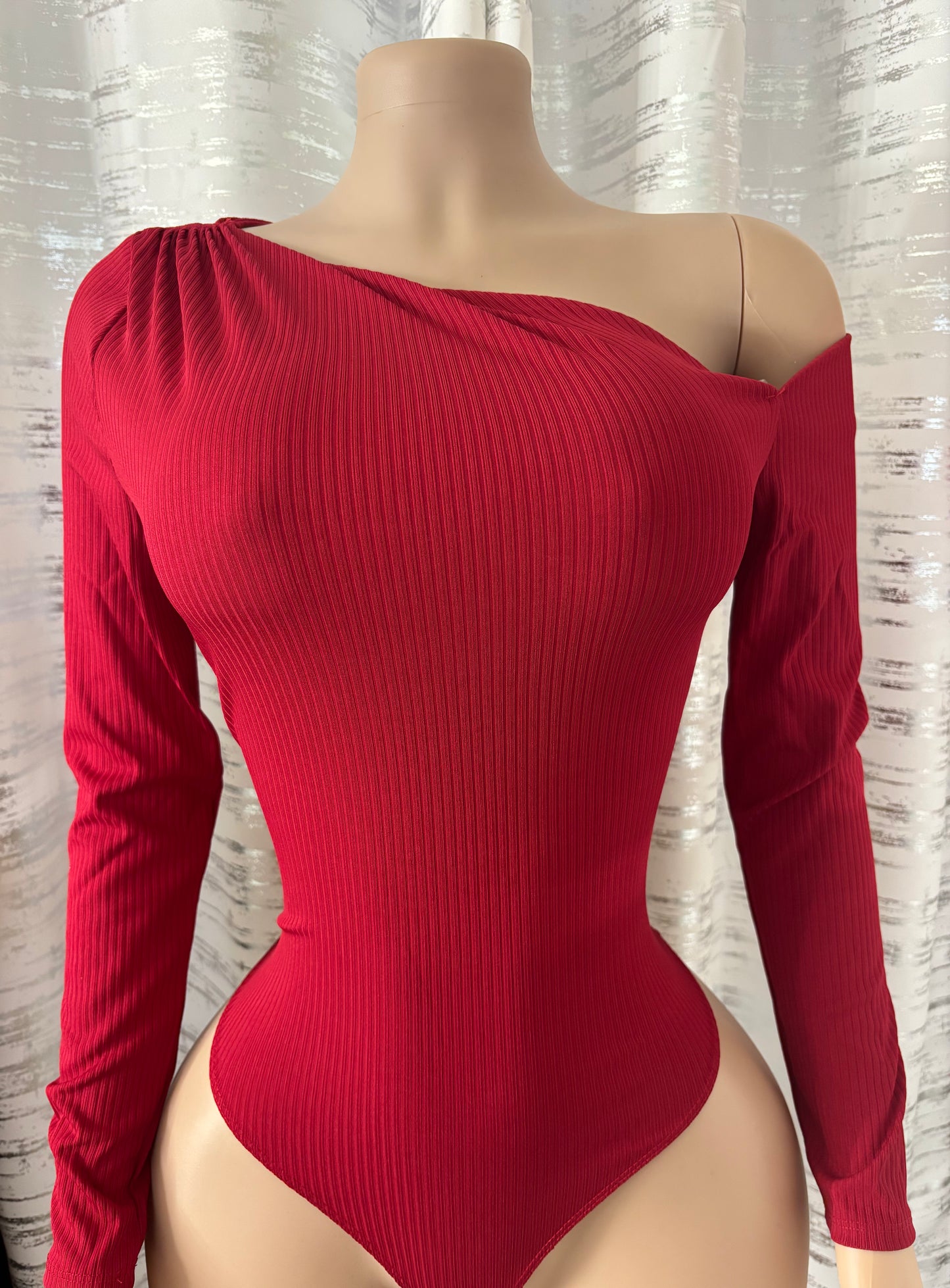 ASYMMETRICAL BODYSUIT